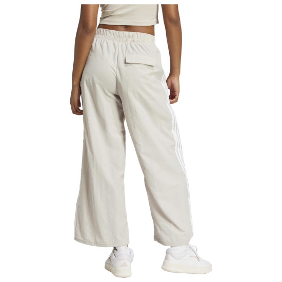Adidas Γυναικείο παντελόνι φόρμας Sportswear Essentials 3-Stripes Woven Pants